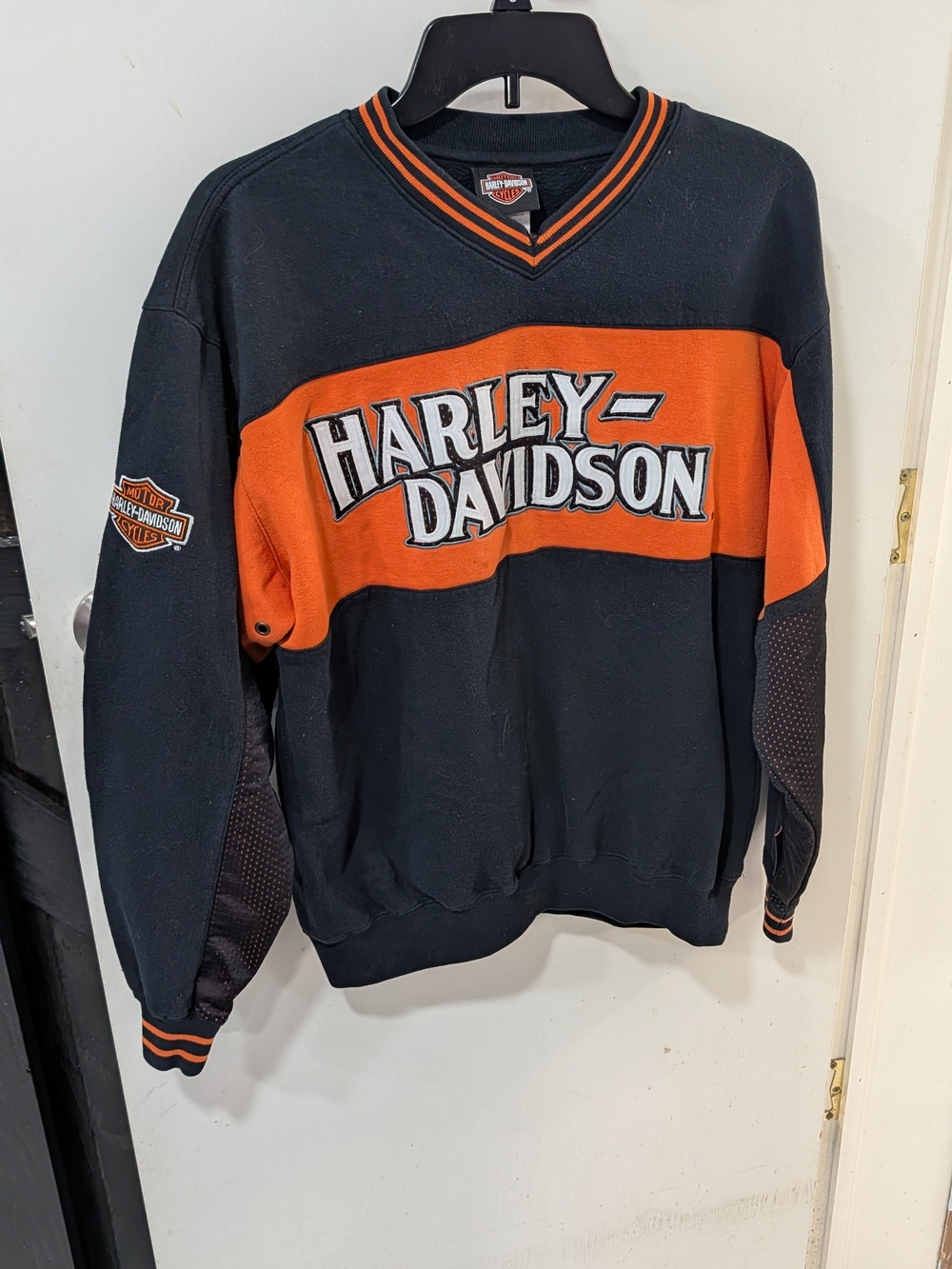 Vintage Harley-Davidson Black & Orange V‑Neck Logo Sweater
